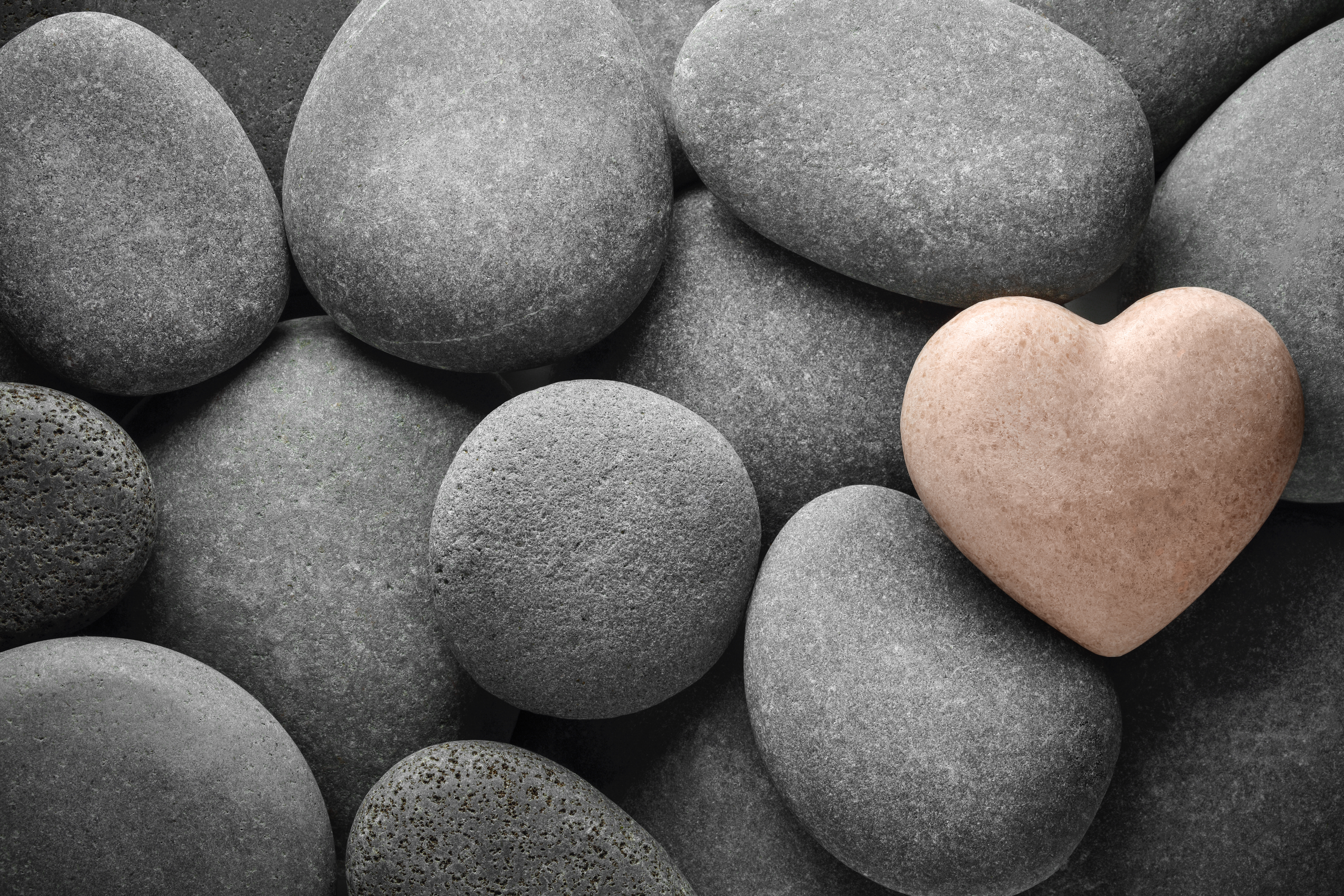Heart made of stone on natural stones